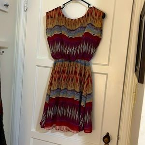 Mini, boho dress. Lightweight, higher sophisticated neckline. New, never used.